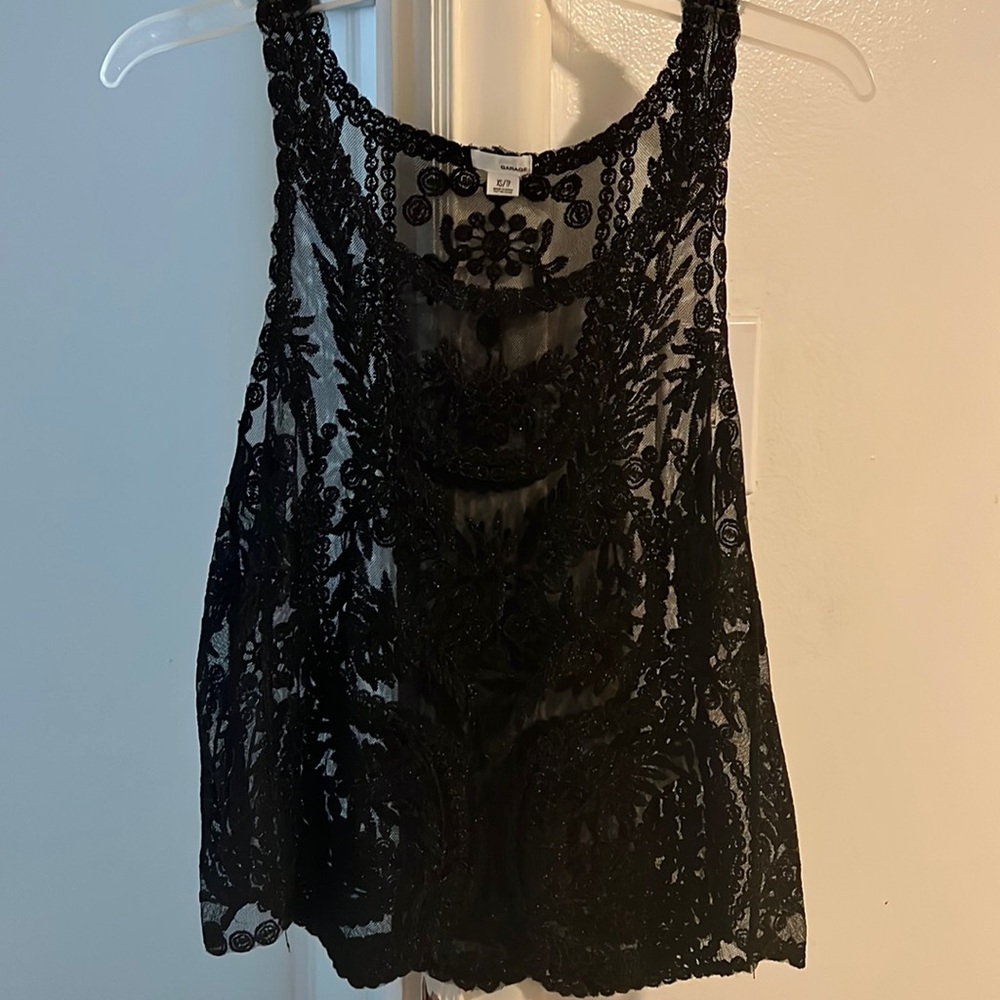A cute black glittery laced top